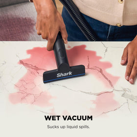 Shark EveryMess action on floors highlights strong suction.