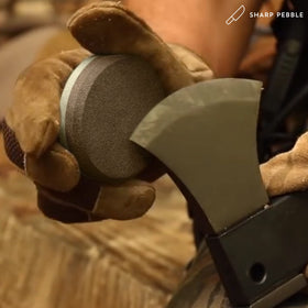 Sharp Pebble bamboo box stores stone securely for portable sharpening.