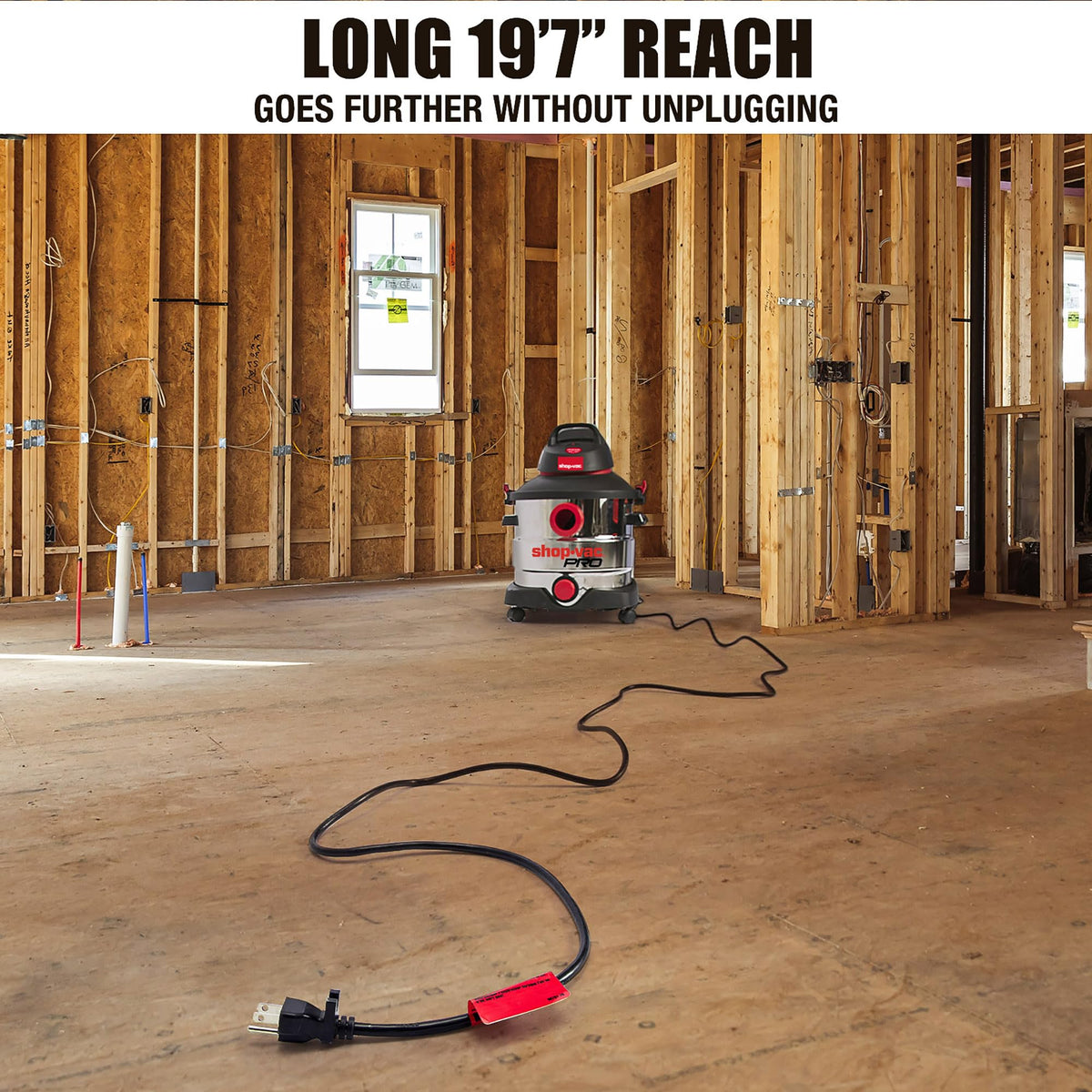 Shop-Vac hose extended to reach tight corners for thorough cleaning