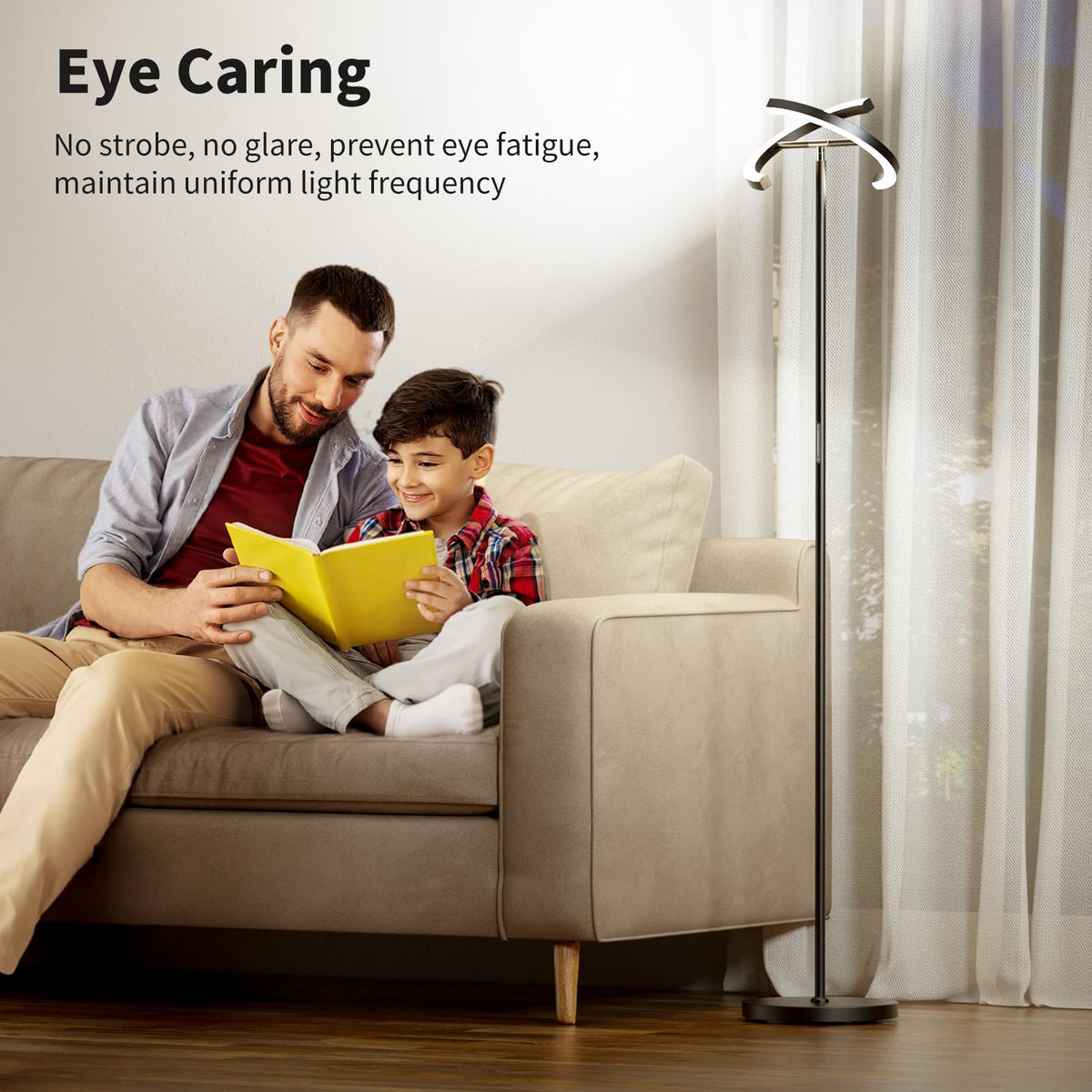Slim base of SIBRILLE floor lamp fits under couches for unobtrusive uplight
