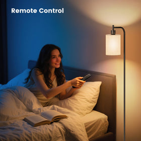 SIBRILLE floor lamp foot pedal enabling hands-free light control.