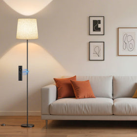 SIBRILLE floor lamp with linen shade creates soft ambient lighting for living spaces.