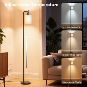 SIBRILLE floor lamp remote control within reach for quick brightness adjustments.