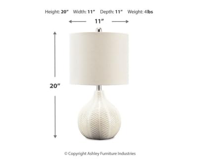 Rainermen lamp with shade attached ready to brighten a compact end table.