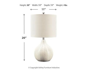 Rainermen lamp with shade attached ready to brighten a compact end table.