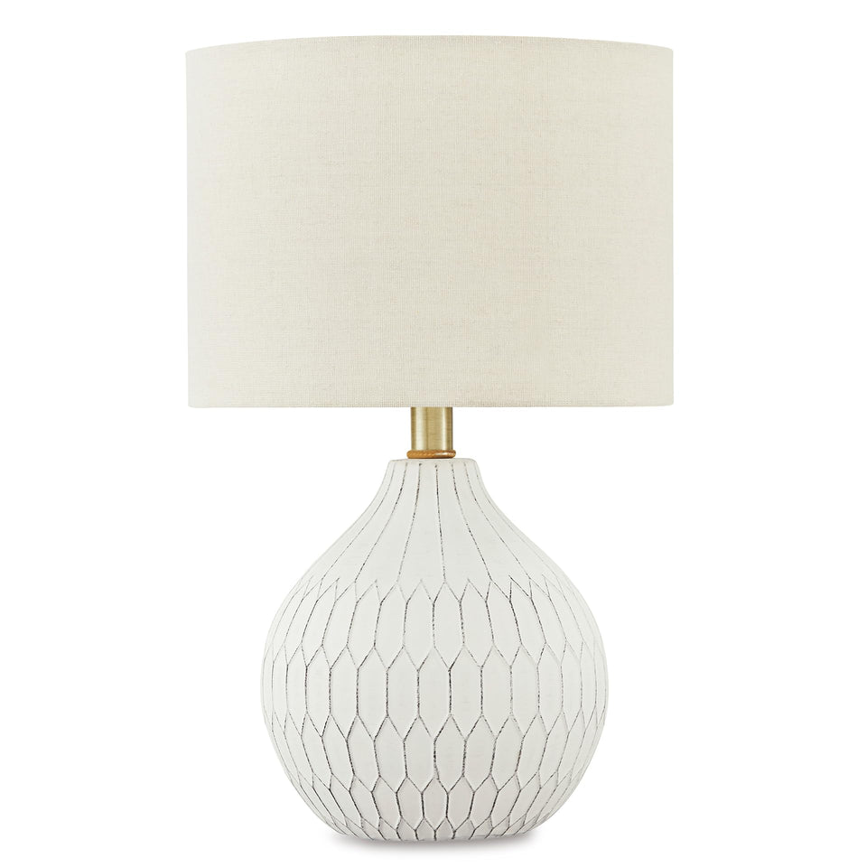 Signature Wardmont table lamp base showcases ceramic craftsmanship for warm ambient lighting.