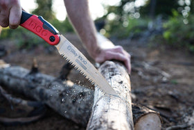 Silky F180 pruning branch cutting in garden setting
