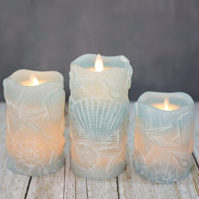Universal remote controls multiple Silverstro candles for coordinated ocean-themed ambience