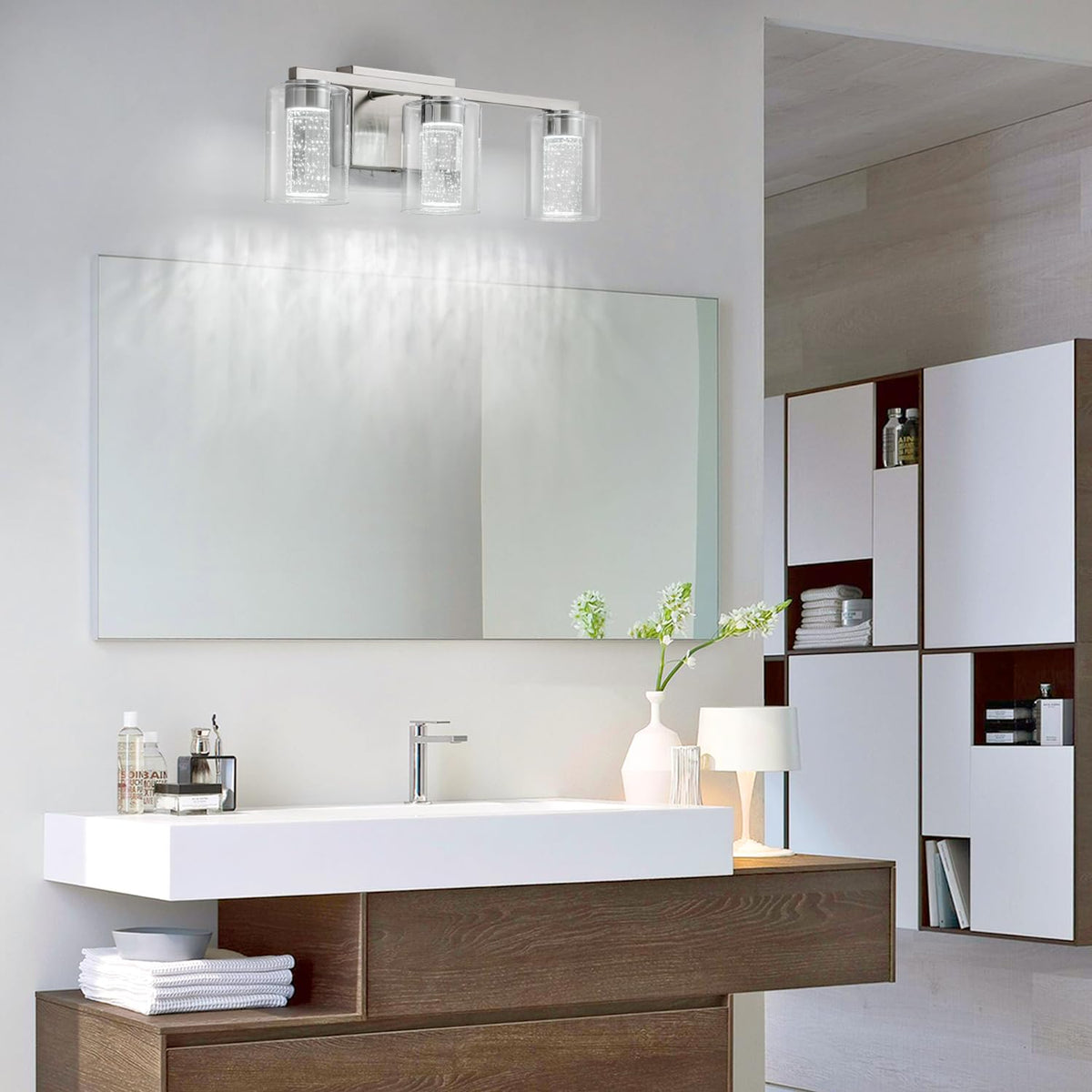 SineRise brushed nickel vanity light design over a bathroom mirror