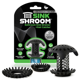 SinkShroom Ultra installed inside the drain, catching hair to help prevent clogs.