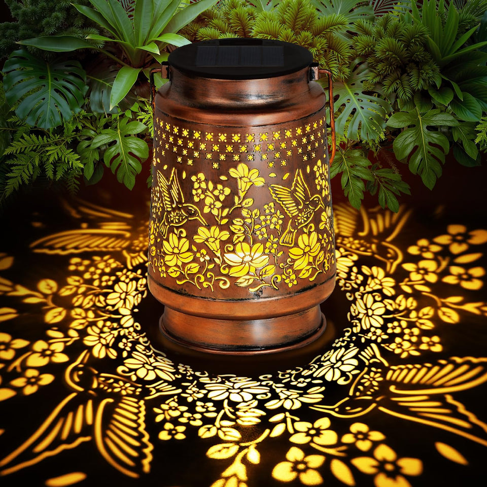 Siruitong solar hummingbird lantern with openwork metal casts warm garden patterns at dusk.