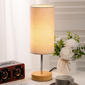 Sixzoonm dresser-end table lamp blends with decor for cozy reading.