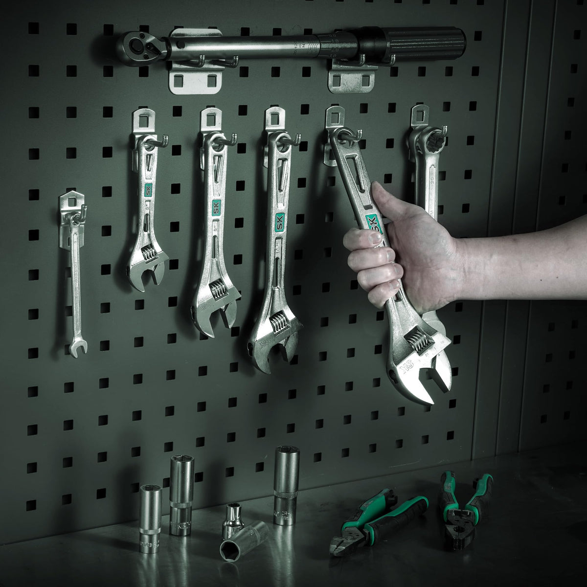 SK 12-Inch adjustable wrench ready for professional use on jobs.