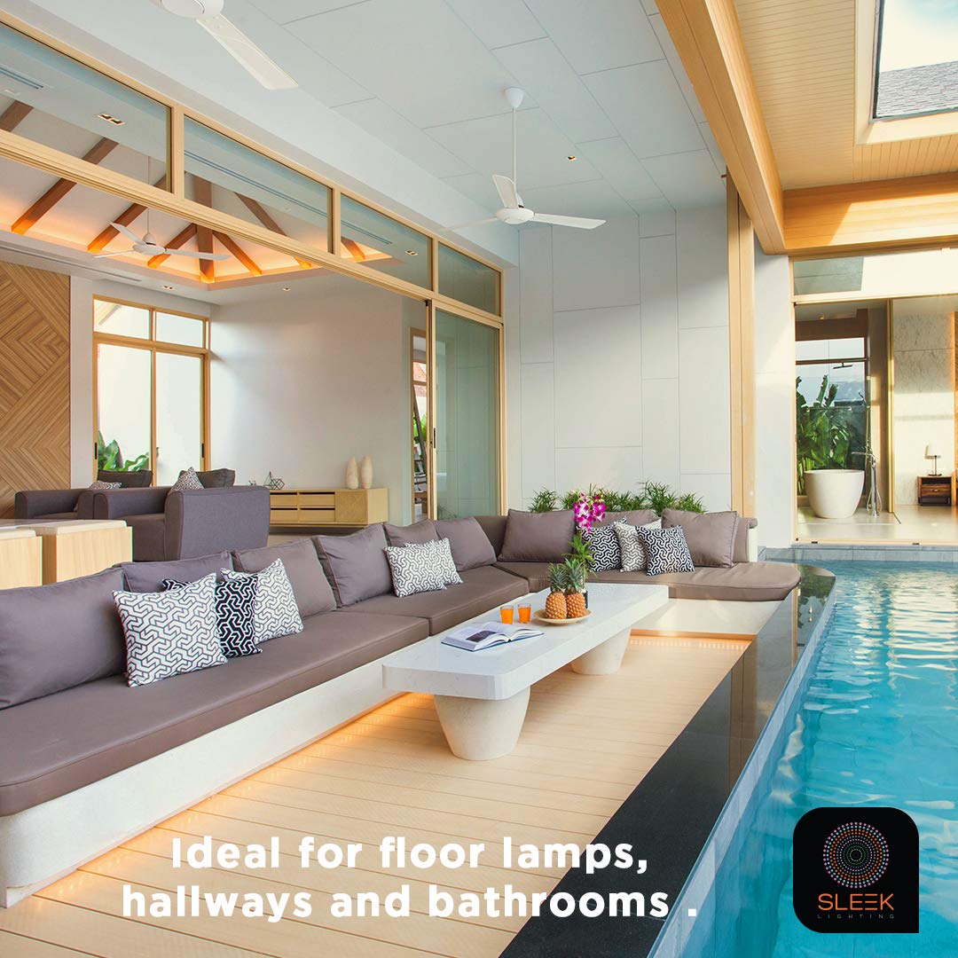 SLEEKLIGHTING bulb beside sofa for warm living room ambiance