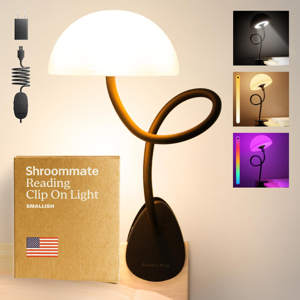 Smallish Shroommate clip-on light on a bed rail for versatile bedside illumination.