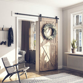 SMARTSTANDARD J-shape hanger installation demonstrates secure, smooth door movement.