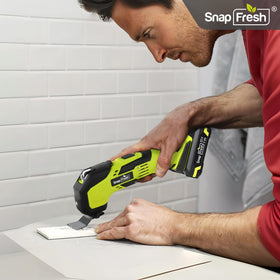 SnapFresh 2Ah battery in hand demonstrates enhanced runtime and portability.