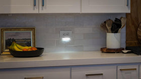 GuideLight Plus auto dusk-to-dawn sensor activates at night for easy navigation.