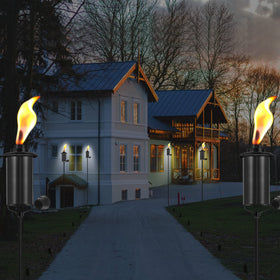 SNOGSWOG garden torch set enhancing outdoor ambience and lighting.