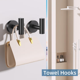 SOAEZ black towel ring keeps hand towels within reach.