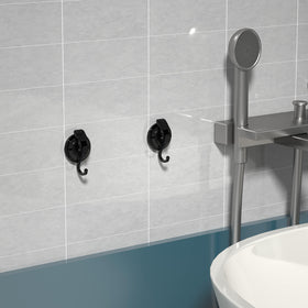 SOCONT suction hook on smooth surface aids air-drying towels.