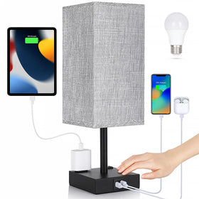 Soilsiu bedside lamp with grey base delivers soft, diffused lighting.