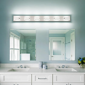 SOLFART bathroom lighting over mirror creates modern ambience.