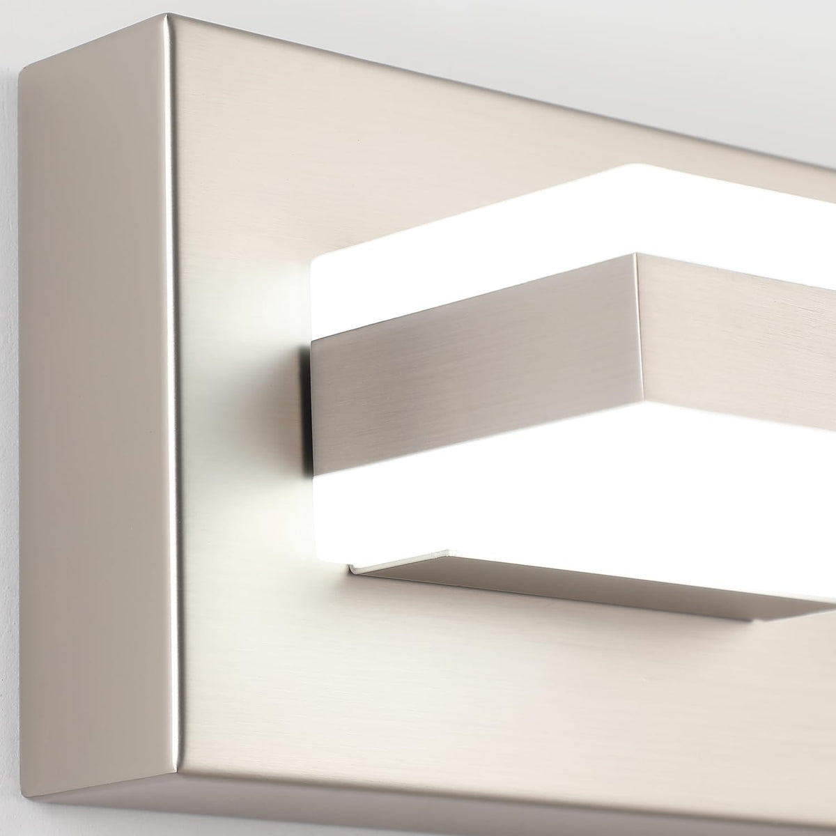 SOLFART modern nickel vanity light with soft illumination.