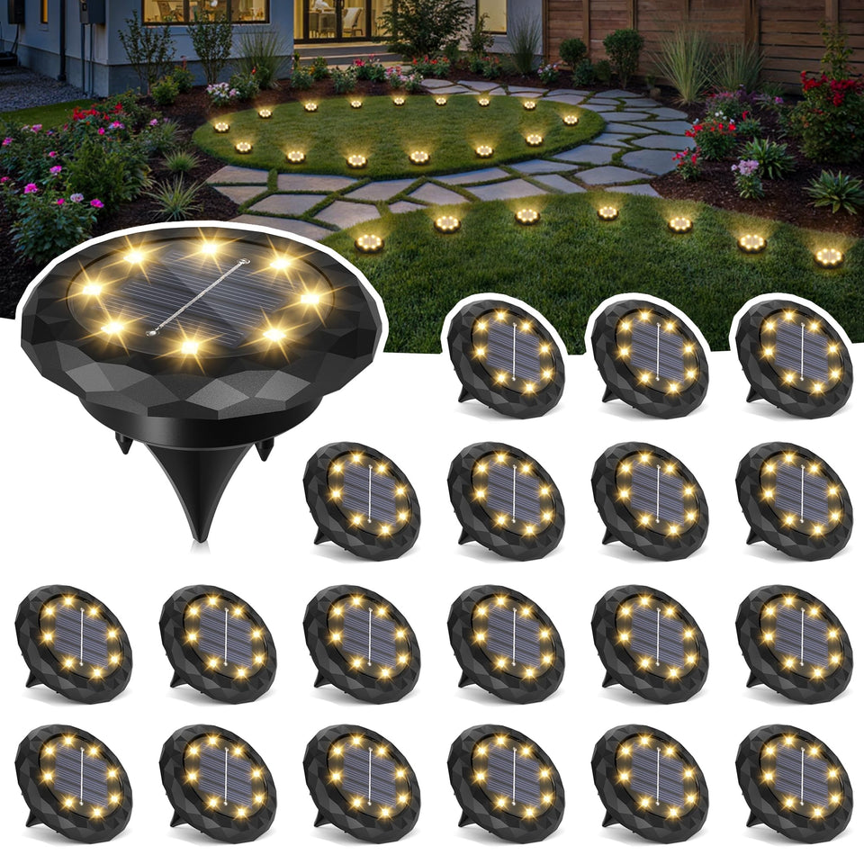 SOLPEX mini solar ground lights illuminate garden paths with warm glow.