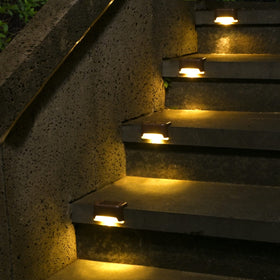SOLPEX solar deck light on stairs provides warm, safe illumination at night.