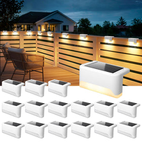 SOLPEX solar fence light illuminates outdoor pathways with warm glow.