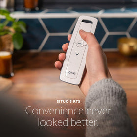 Somfy Situo 5 Pure remote side angle shows easy control across multiple shades.