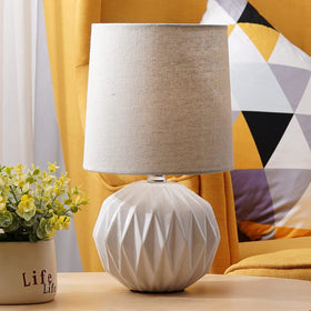 Somniferous ceramic textured base closeup highlighting durable, stylish design.