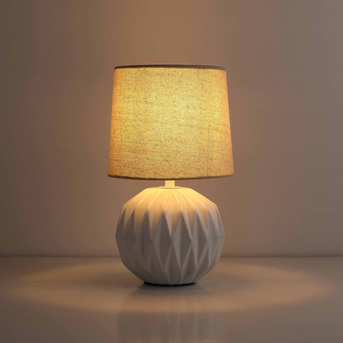 Somniferous linen shade detail softens brightness for comfortable reading.