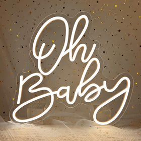 Songyuneon Oh Baby neon sign enhances baby shower backdrop with soft glow.