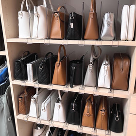 SortNStore wardrobe and towel organization on wood shelves maximizing space.