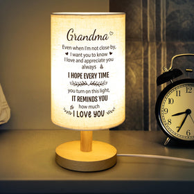 SOUHONEY nana gift table lamp enhances a cozy reading space