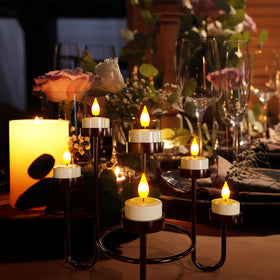 SoulBay dining table setup with warm ambient tea lights.