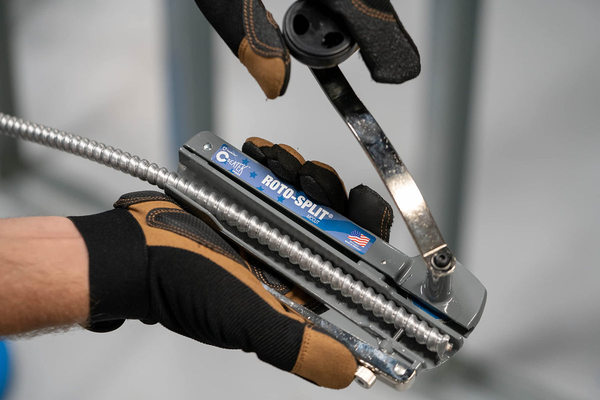 Cuts and strips armored cable for clean terminations