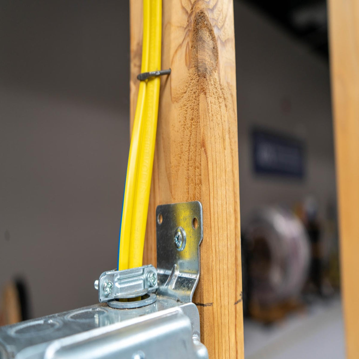 Southwire NM-B cable installed in a dry, above-ground wall.