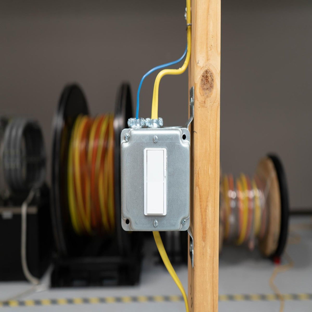Southwire NM-B 10ga 3-conductor pink cable shown in wall installation.