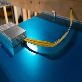 Southwire Romex SIMpull 14/3 blue installation cable for above-ground runs.