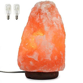 Spantik Himalayan salt lamp with dimmer cord on wood base for ambient lighting.