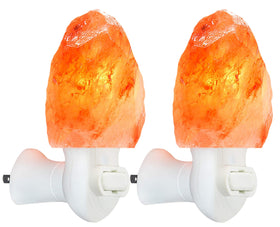 Spantik pink Himalayan salt lamp hand carved with warm amber glow for a cozy bedroom ambiance.