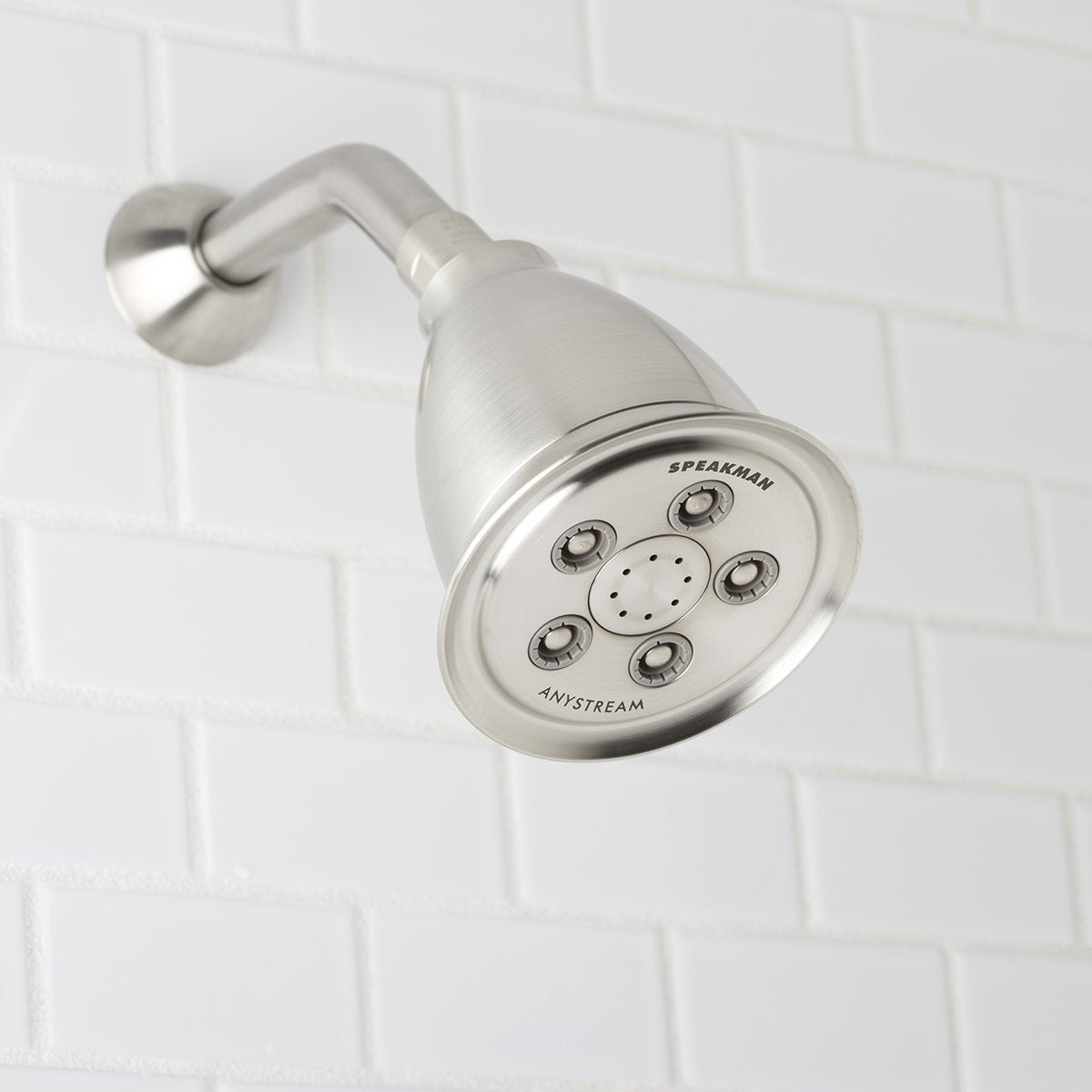 Speakman Anystream hotel showerhead showing eight center massage jets for targeted relief.