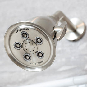 Speakman showerhead uses brass and plastic construction for lasting reliability.