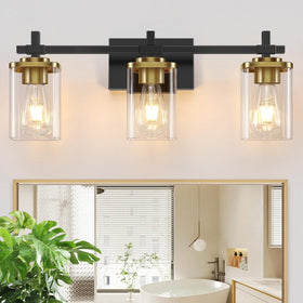 Spiglamm 3-Lights black and gold bathroom light fixture above mirror for elegant ambiance