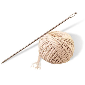 SpitJack meat-trussing-needle with 7-inch tip ready for secure roasting.
