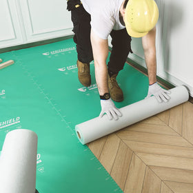 Spriteshield S-180G 3-in-1 kit roll protecting floors during renovation for residue-free cleanup