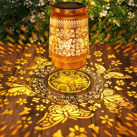 Stadeco antique bronze lantern for outdoor use creates a charming evening ambiance.